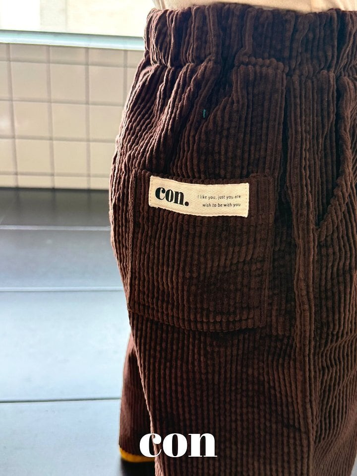 con corduroy pants