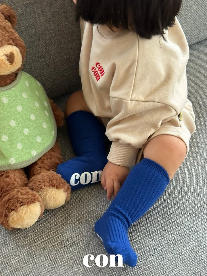 con reversible bib