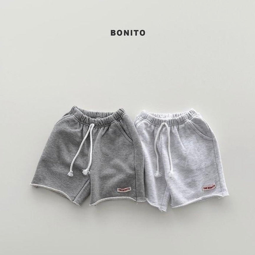 Raw-edge half pants