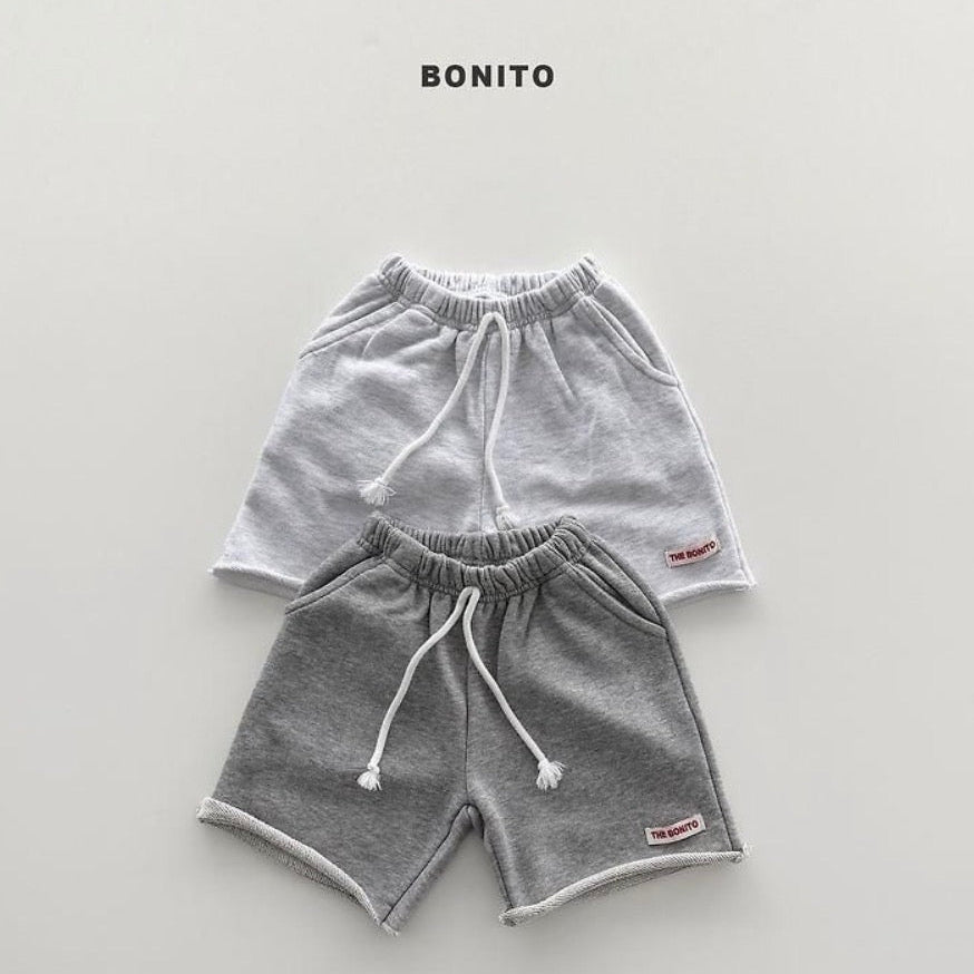 Raw-edge half pants