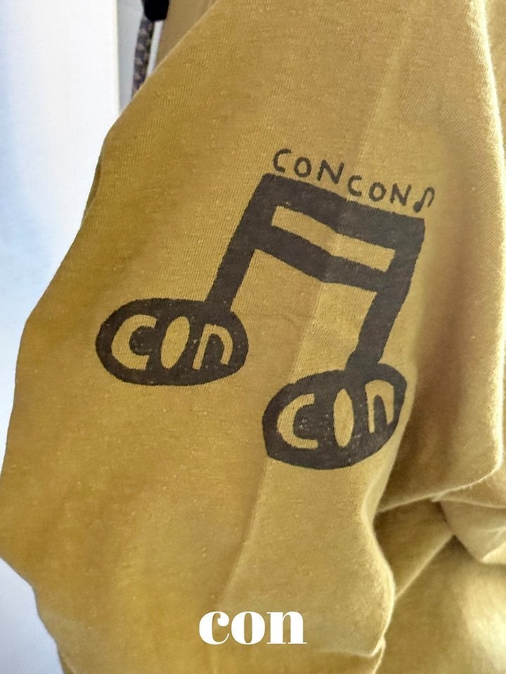 con music note T
